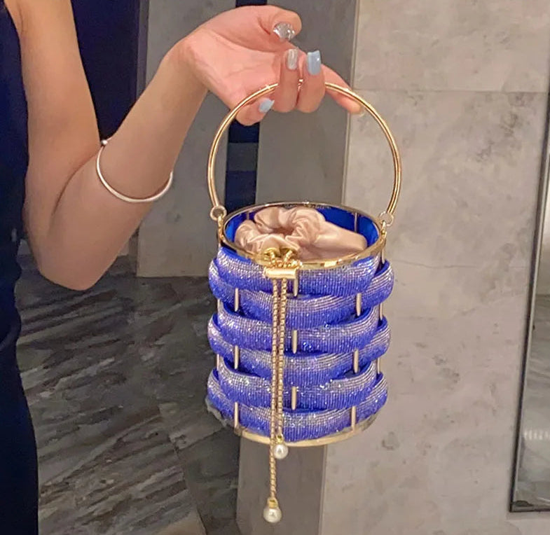 Blue beaded handbag with gold accents 